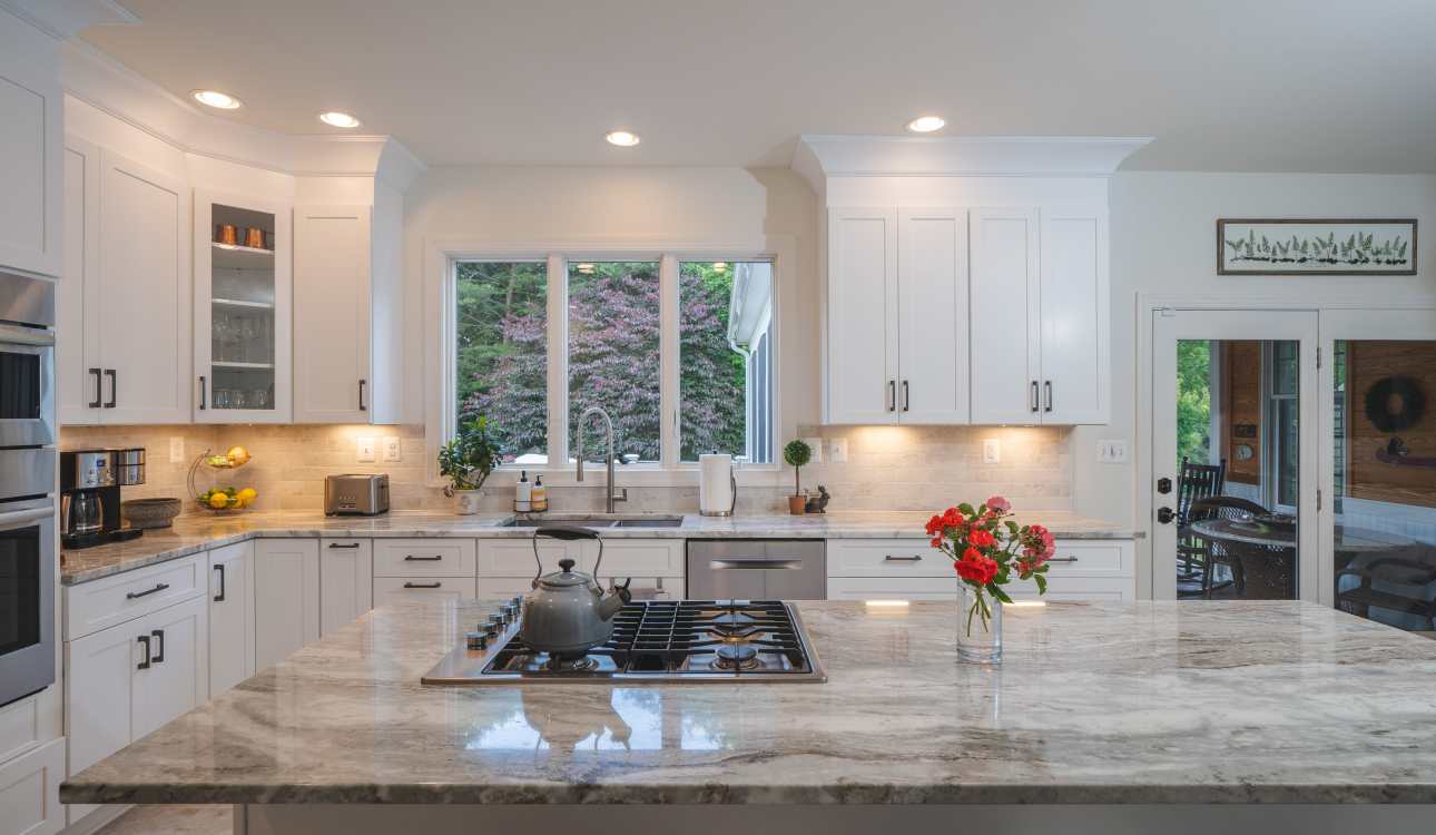 My Kitchen and Bath's Kitchen Remodeling Project Photos in Wolf Trap, VA - White Kitchen Cabinets with Fantasy Brown Granite Countertop. Kitchen Decor Ideas in 2025